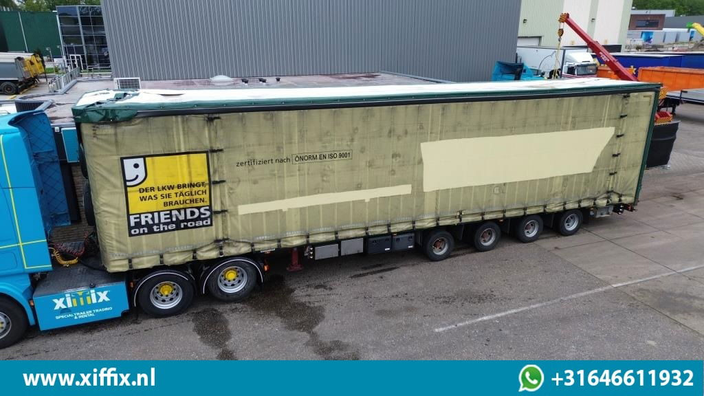 Meusburger 4-ass. Vlakke Mega oplegger met elektrische huifopbouw / 2x naloop ge - Semi-reboque plataforma/ Caixa aberta: foto 1 Meusburger 4-ass. Vlakke Mega oplegger met elektrische huifopbouw / 2x naloop ge - Semi-reboque plataforma/ Caixa aberta: foto 1