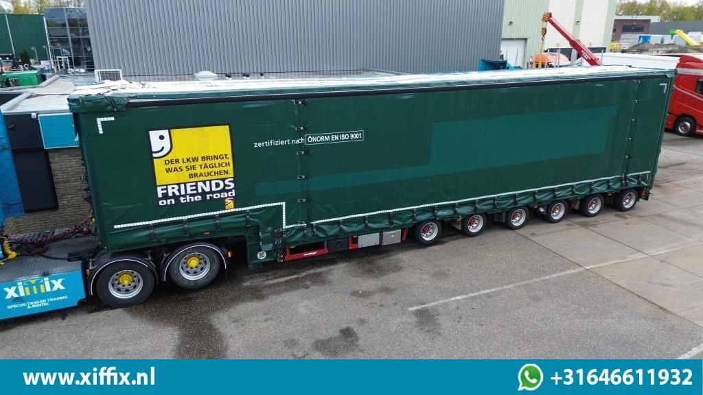 Meusburger 6-ass. Semi dieplader met elektische huifopbouw / 3x naloop gestuurd - Semireboque baixa: foto 1 Meusburger 6-ass. Semi dieplader met elektische huifopbouw / 3x naloop gestuurd - Semireboque baixa: foto 1