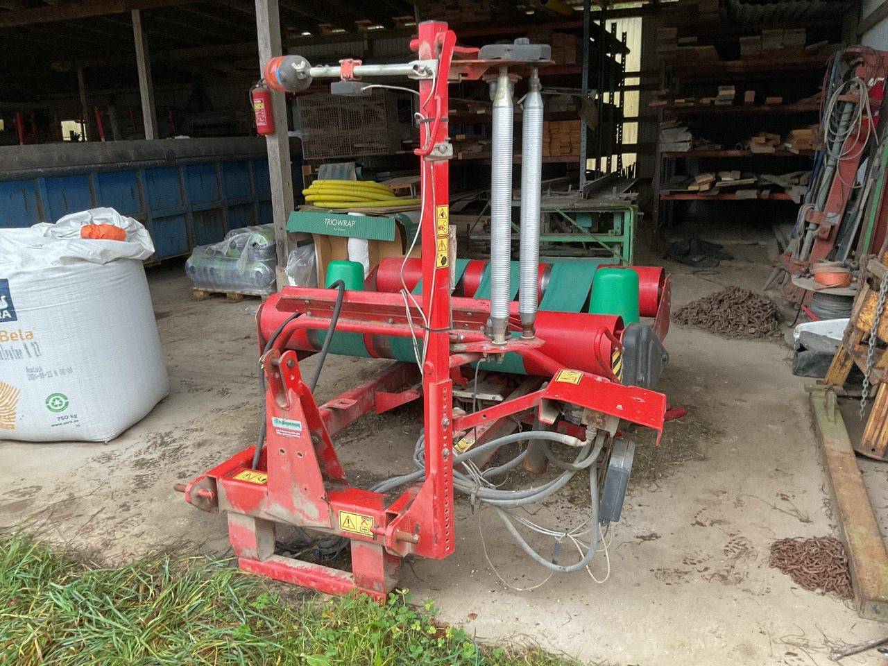 Kverneland 7558 - Empacotador de fardos: foto 1 Kverneland 7558 - Empacotador de fardos: foto 1