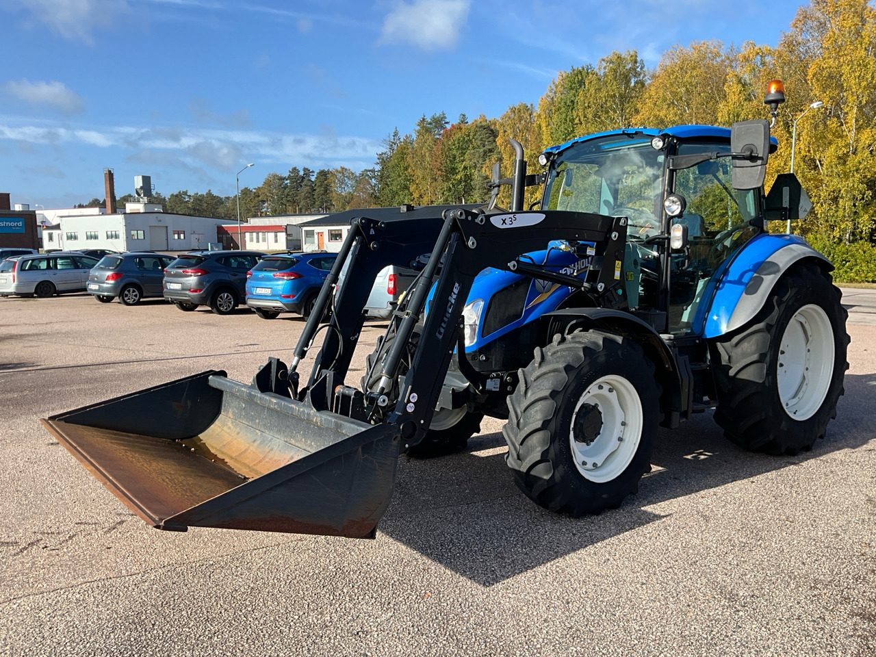 New Holland T5.85 - Trator: foto 1 New Holland T5.85 - Trator: foto 1