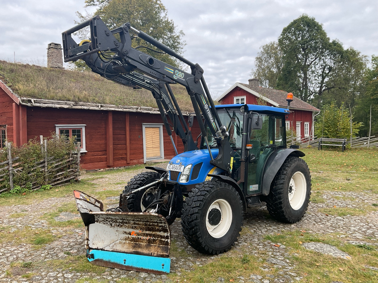 New Holland TN75SA - Trator: foto 1 New Holland TN75SA - Trator: foto 1
