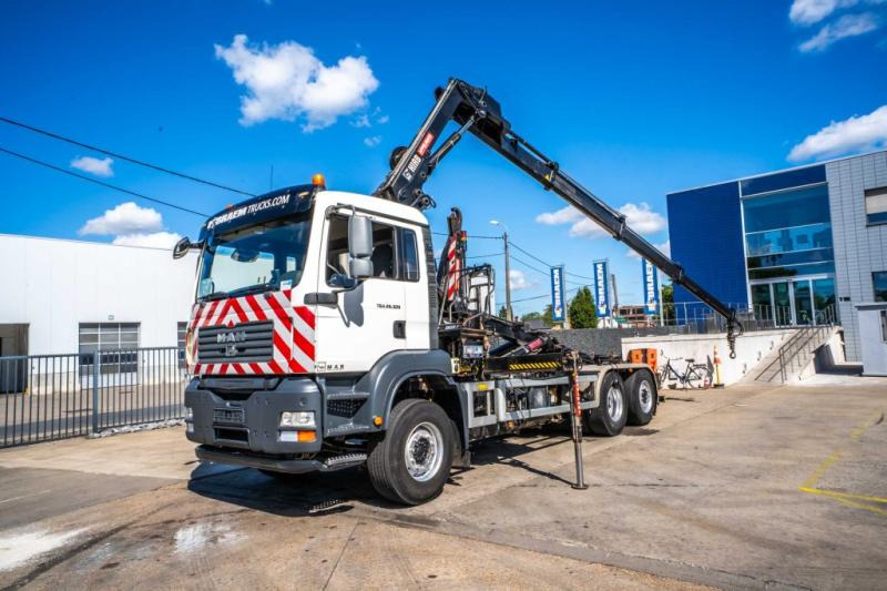 MAN TGA 26.320 BL -6X2-4+HIAB 122 E3 HIDUO - Caminhão polibenne, Caminhão grua: foto 1 MAN TGA 26.320 BL -6X2-4+HIAB 122 E3 HIDUO - Caminhão polibenne, Caminhão grua: foto 1