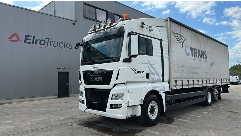MAN TGX 26.400 (EURO 6 / 6X2 / LIFT / HAYON / BELGIAN TRUCK / GUTE ZUSTAND !! / 8.40 BOX LENGTH) - Caminhão com lona: foto 1 MAN TGX 26.400 (EURO 6 / 6X2 / LIFT / HAYON / BELGIAN TRUCK / GUTE ZUSTAND !! / 8.40 BOX LENGTH) - Caminhão com lona: foto 1