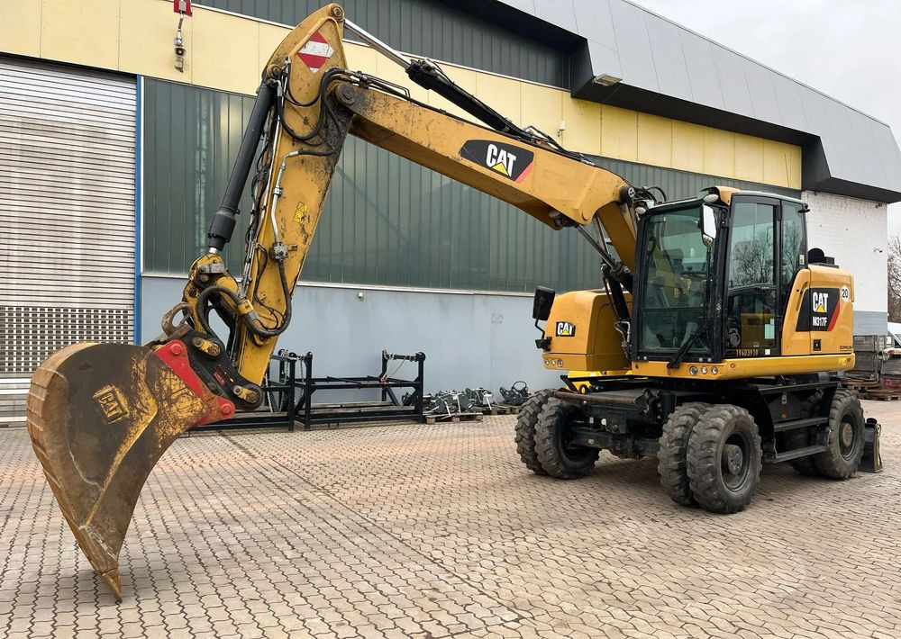 Caterpillar M317F, 2019 ROK, 5100 MTH, OIL QUICK - Escavadeira de rodas: foto 1 Caterpillar M317F, 2019 ROK, 5100 MTH, OIL QUICK - Escavadeira de rodas: foto 1