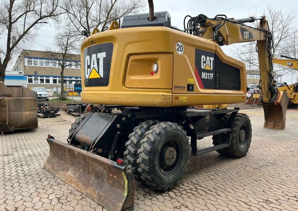 Caterpillar M317F, 2019 ROK, 5100 MTH, OIL QUICK - Escavadeira de rodas: foto 2 Caterpillar M317F, 2019 ROK, 5100 MTH, OIL QUICK - Escavadeira de rodas: foto 2