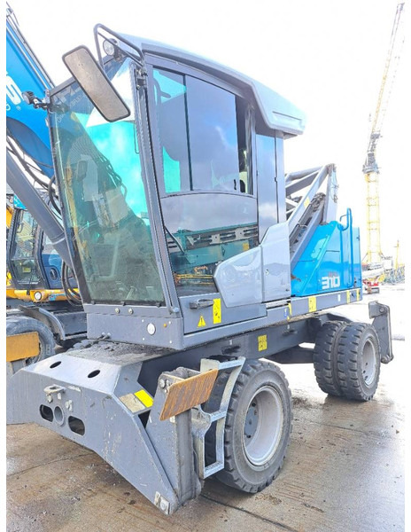 Manipulador de material para transporte de lixo Fuchs MHL 310: foto 8