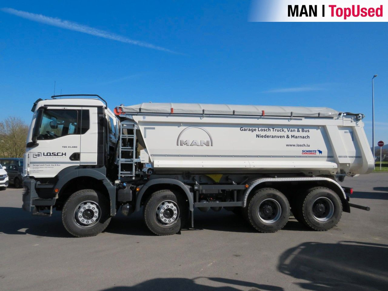 MAN TGS 41.480 8x4 BB CH Schmitz Muldenkipper - Caminhão multibenne: foto 2 MAN TGS 41.480 8x4 BB CH Schmitz Muldenkipper - Caminhão multibenne: foto 2
