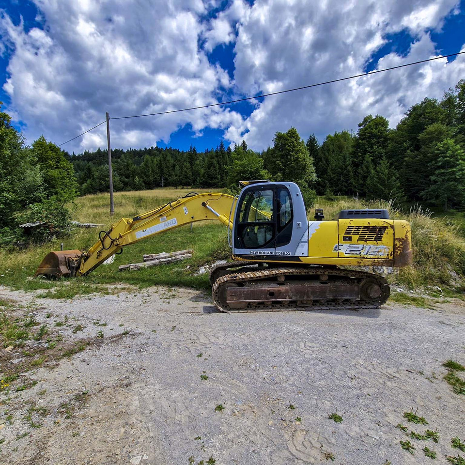New Holland Kobelco E215 - Escavadora de rastos: foto 1 New Holland Kobelco E215 - Escavadora de rastos: foto 1