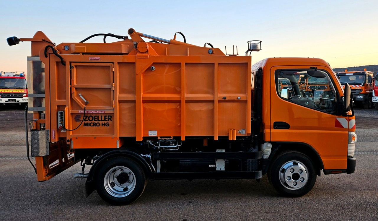Mitsubishi Fuso Canter 6S15 Zoeller Micro Müllpresse - Caminhão de lixo: foto 5 Mitsubishi Fuso Canter 6S15 Zoeller Micro Müllpresse - Caminhão de lixo: foto 5