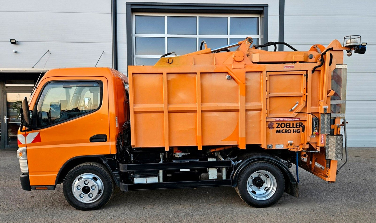 Mitsubishi Fuso Canter 6S15 Zoeller Micro Müllpresse - Caminhão de lixo: foto 2 Mitsubishi Fuso Canter 6S15 Zoeller Micro Müllpresse - Caminhão de lixo: foto 2