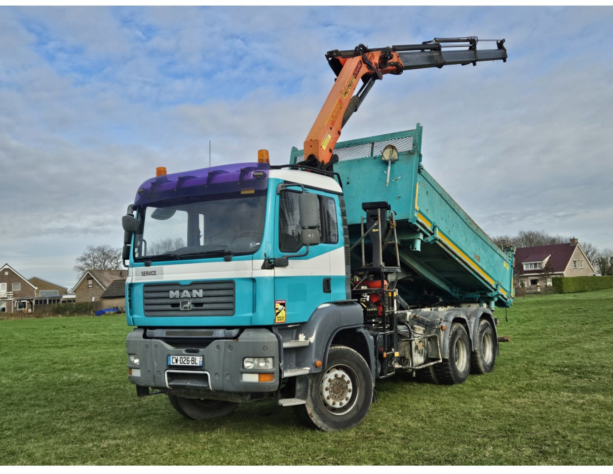MAN TGA 33.360 TIPPER 3 SIDE CRANE PALFINGER 16502 *REMOTE CONTROL - Caminhão basculante: foto 1 MAN TGA 33.360 TIPPER 3 SIDE CRANE PALFINGER 16502 *REMOTE CONTROL - Caminhão basculante: foto 1