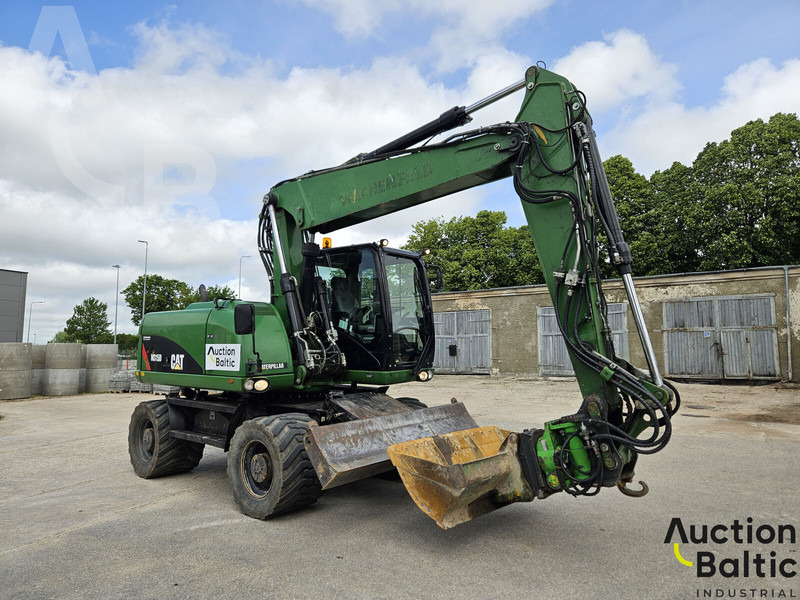 Caterpillar M315D - Escavadeira de rodas: foto 1 Caterpillar M315D - Escavadeira de rodas: foto 1