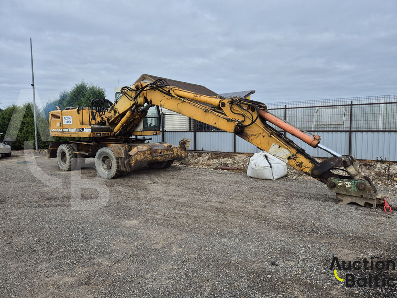 Liebherr A 902 Litronic - Escavadeira de rodas: foto 1 Liebherr A 902 Litronic - Escavadeira de rodas: foto 1