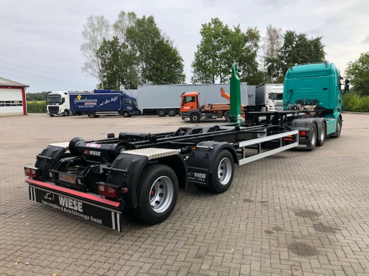 Auflieger Abrollkipper Hakenlift Hooklift - Semireboque transportador de contêineres/ Caixa móvel: foto 3 Auflieger Abrollkipper Hakenlift Hooklift - Semireboque transportador de contêineres/ Caixa móvel: foto 3