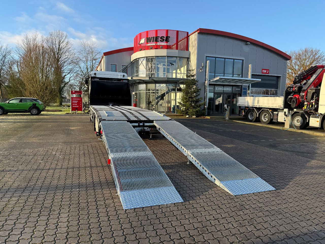 MAN Baumaschinen- Arbeitsbühnentransporter Rampen - Caminhão transporte de veículos: foto 4 MAN Baumaschinen- Arbeitsbühnentransporter Rampen - Caminhão transporte de veículos: foto 4