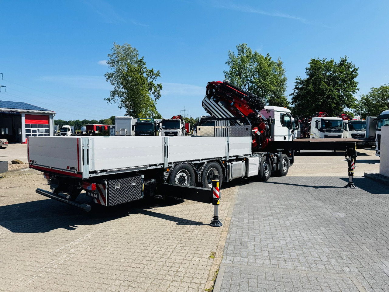 MAN TGS 32.510 mit F710 Frontkran sofort - Caminhão grua: foto 4 MAN TGS 32.510 mit F710 Frontkran sofort - Caminhão grua: foto 4