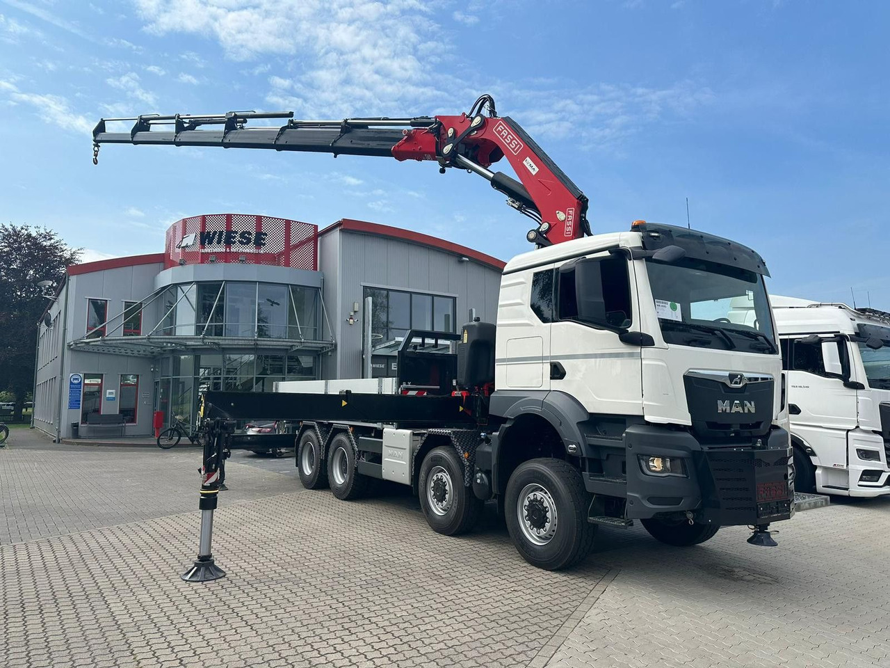MAN TGS 41.520 8x8 mit Fassi Ladekran F710RA.2.26 - Caminhão grua: foto 1 MAN TGS 41.520 8x8 mit Fassi Ladekran F710RA.2.26 - Caminhão grua: foto 1