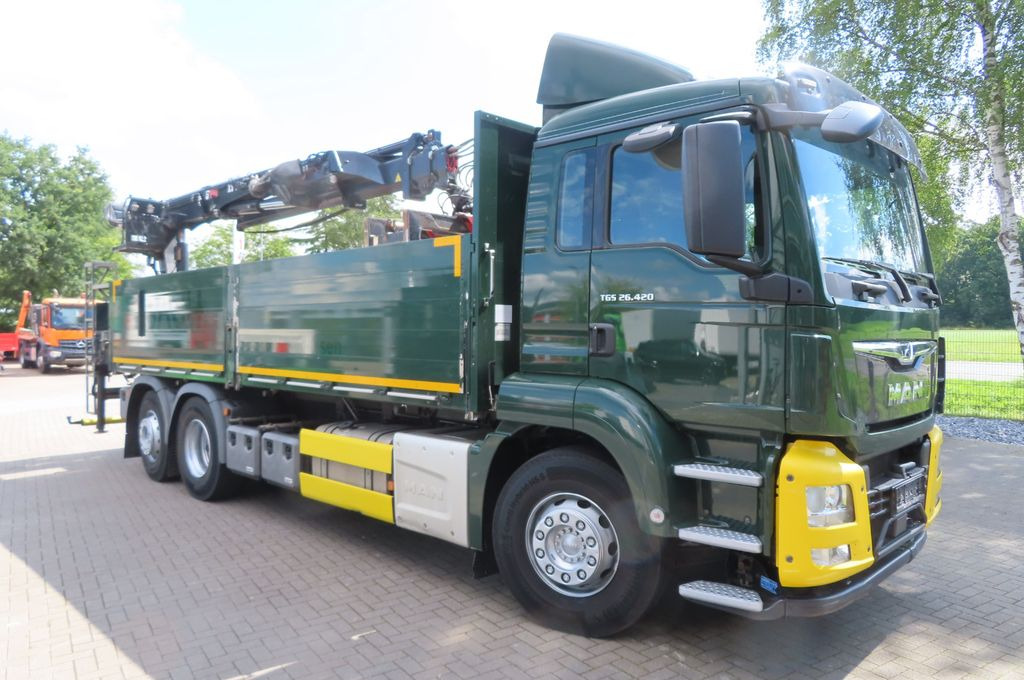 MAN TGX 26.500 6x2 - Baustoff - HIAB Kran - Camião de caixa aberta/ Plataforma, Caminhão grua: foto 2 MAN TGX 26.500 6x2 - Baustoff - HIAB Kran - Camião de caixa aberta/ Plataforma, Caminhão grua: foto 2