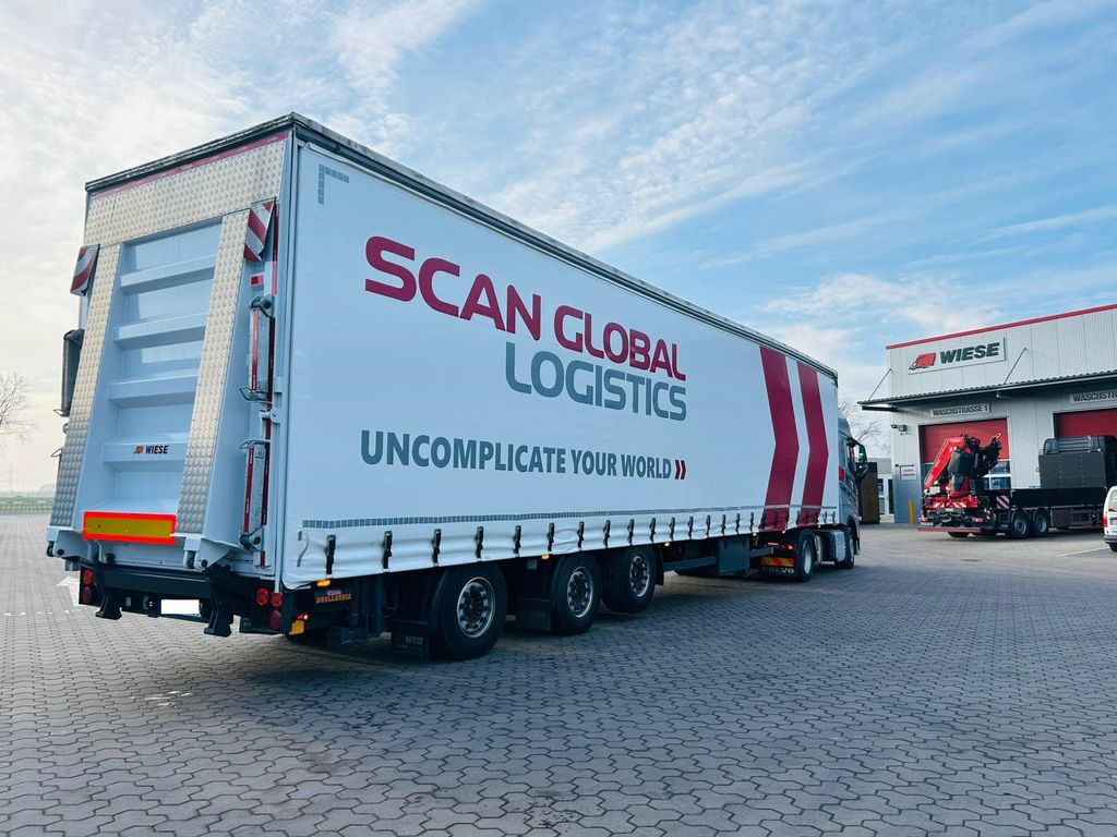 Mega Gabelstaplertransporter Ladebordwand9t - Semi-reboque plataforma/ Caixa aberta: foto 2 Mega Gabelstaplertransporter Ladebordwand9t - Semi-reboque plataforma/ Caixa aberta: foto 2