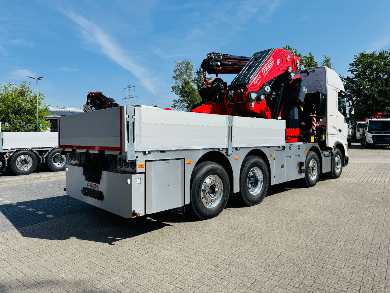Volvo FH 540 mit Fassi F2150RAL Fly Jib + Winde - Camião de caixa aberta/ Plataforma, Caminhão grua: foto 2 Volvo FH 540 mit Fassi F2150RAL Fly Jib + Winde - Camião de caixa aberta/ Plataforma, Caminhão grua: foto 2