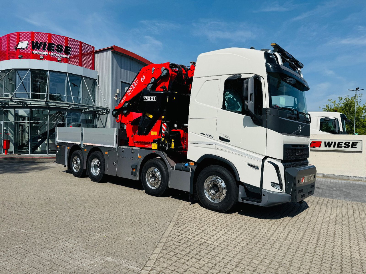 Volvo FH 540 mit Fassi F2150RAL Fly Jib + Winde - Camião de caixa aberta/ Plataforma, Caminhão grua: foto 3 Volvo FH 540 mit Fassi F2150RAL Fly Jib + Winde - Camião de caixa aberta/ Plataforma, Caminhão grua: foto 3