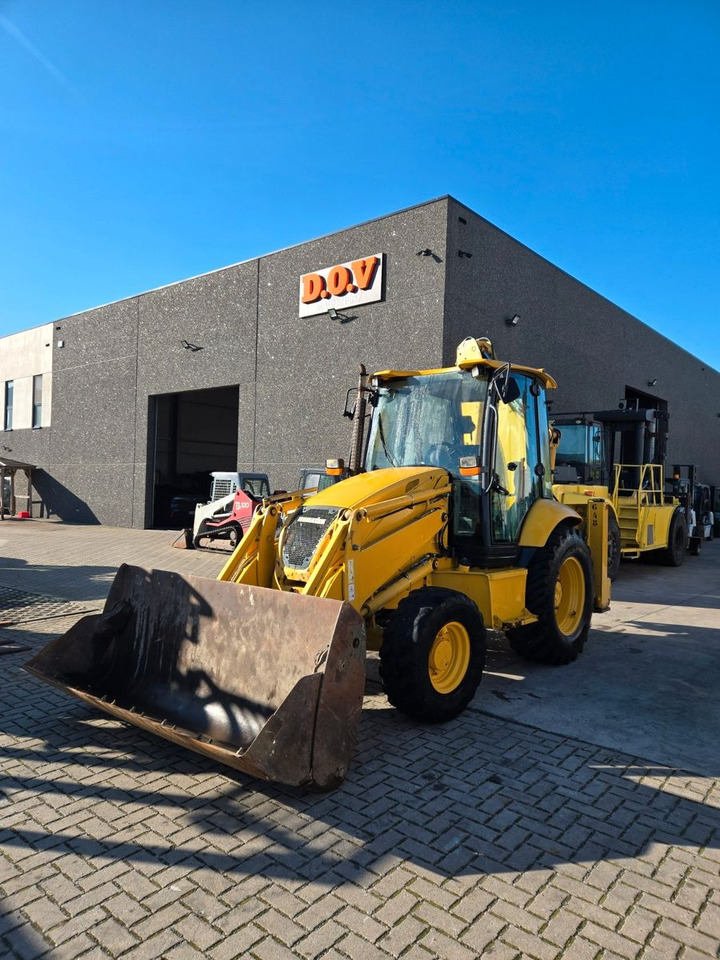 Komatsu WB97 - Retroescavadeira: foto 1 Komatsu WB97 - Retroescavadeira: foto 1