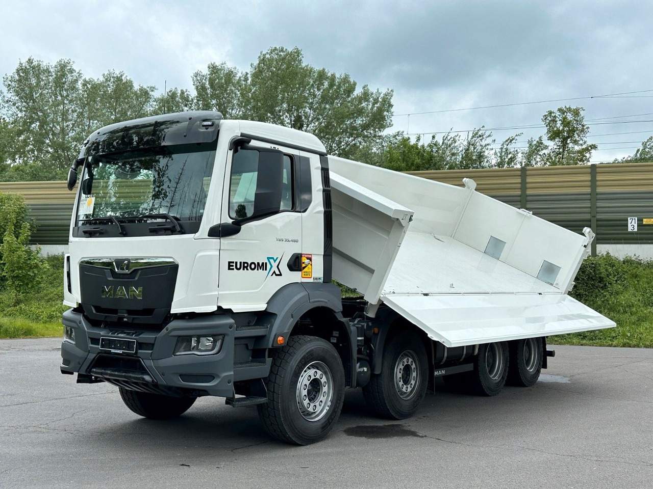 MAN TGS 35.480 8x4 EuromixMTP 2-Seiten-Kipper - Caminhão basculante: foto 1 MAN TGS 35.480 8x4 EuromixMTP 2-Seiten-Kipper - Caminhão basculante: foto 1