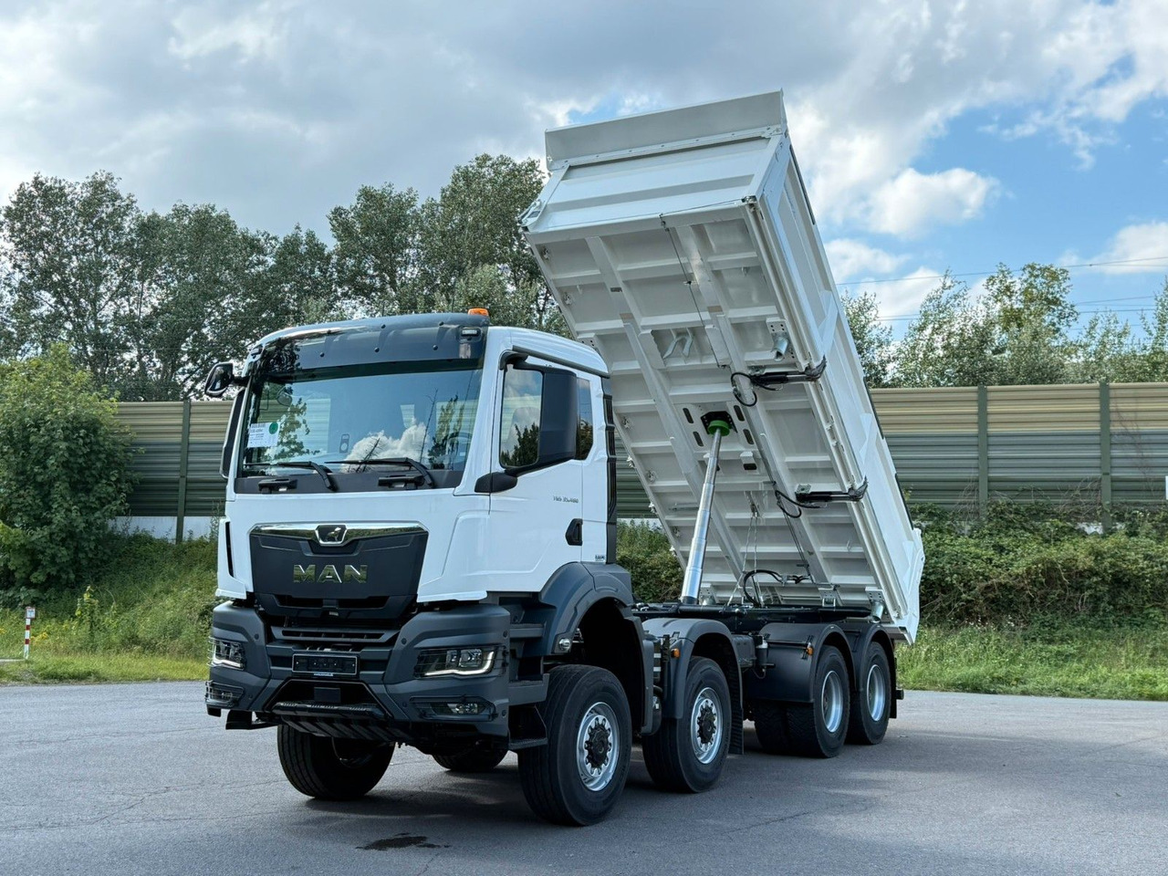 MAN TGS 35.480 8x8 EuromixMTP 3-Seiten-Kipper - Caminhão basculante: foto 2 MAN TGS 35.480 8x8 EuromixMTP 3-Seiten-Kipper - Caminhão basculante: foto 2