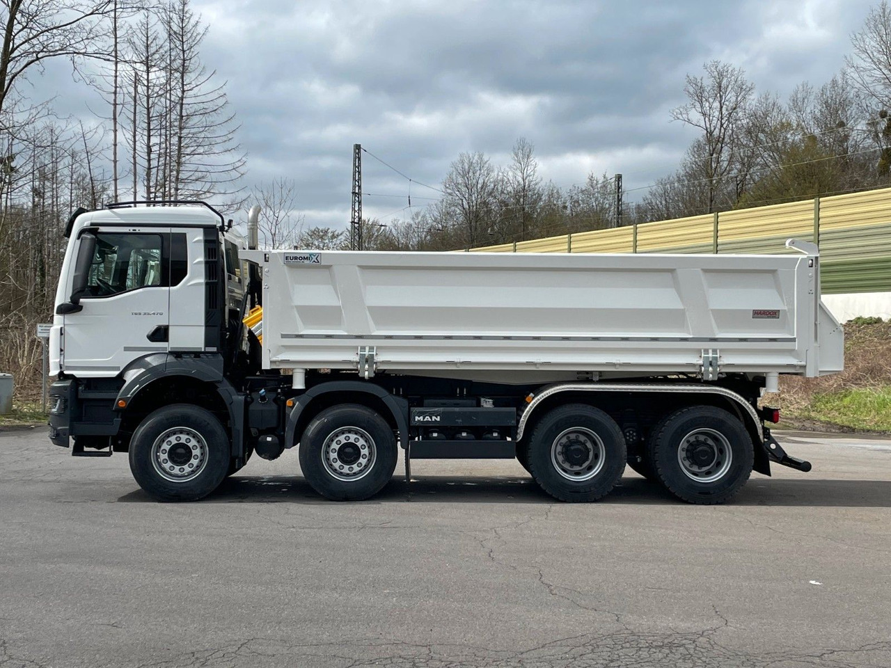 MAN TGS 35.520 8x4 EuromixMTP 3-Seiten-Kipper - Caminhão basculante: foto 3 MAN TGS 35.520 8x4 EuromixMTP 3-Seiten-Kipper - Caminhão basculante: foto 3
