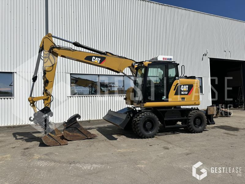 Caterpillar M315F - Escavadeira de rodas: foto 1 Caterpillar M315F - Escavadeira de rodas: foto 1