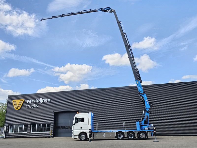 MAN TGX 35.480 8x4-4 / HMF 85 t/m + JIB / WINCH - Camião de caixa aberta/ Plataforma, Caminhão grua: foto 2 MAN TGX 35.480 8x4-4 / HMF 85 t/m + JIB / WINCH - Camião de caixa aberta/ Plataforma, Caminhão grua: foto 2
