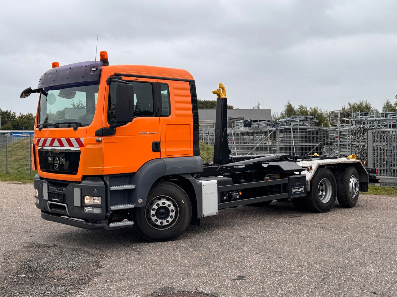 MAN 26.40 6X2 Meiller RK 20.70 mit Funk - Caminhão polibenne: foto 1 MAN 26.40 6X2 Meiller RK 20.70 mit Funk - Caminhão polibenne: foto 1