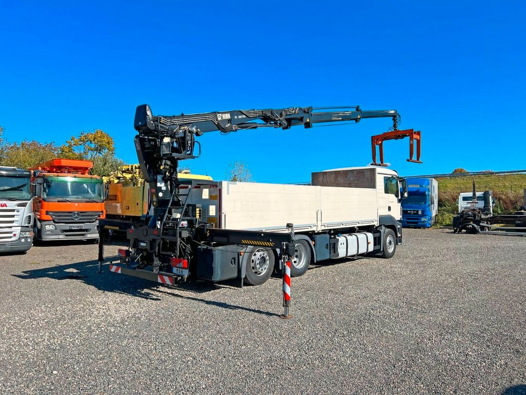 MAN 26.480 6X2 Baustoff mit Kran HIAB Top Zustand - Caminhão grua, Camião de caixa aberta/ Plataforma: foto 1 MAN 26.480 6X2 Baustoff mit Kran HIAB Top Zustand - Caminhão grua, Camião de caixa aberta/ Plataforma: foto 1