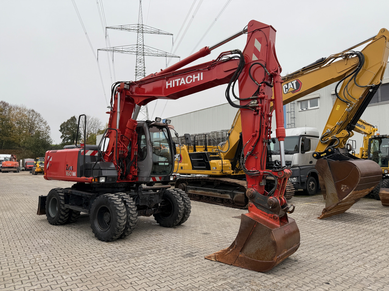 Hitachi ZX 160 W Mobilbagger Klima Zentralschmierung OQ 60-5 - Escavadeira de rodas: foto 3 Hitachi ZX 160 W Mobilbagger Klima Zentralschmierung OQ 60-5 - Escavadeira de rodas: foto 3