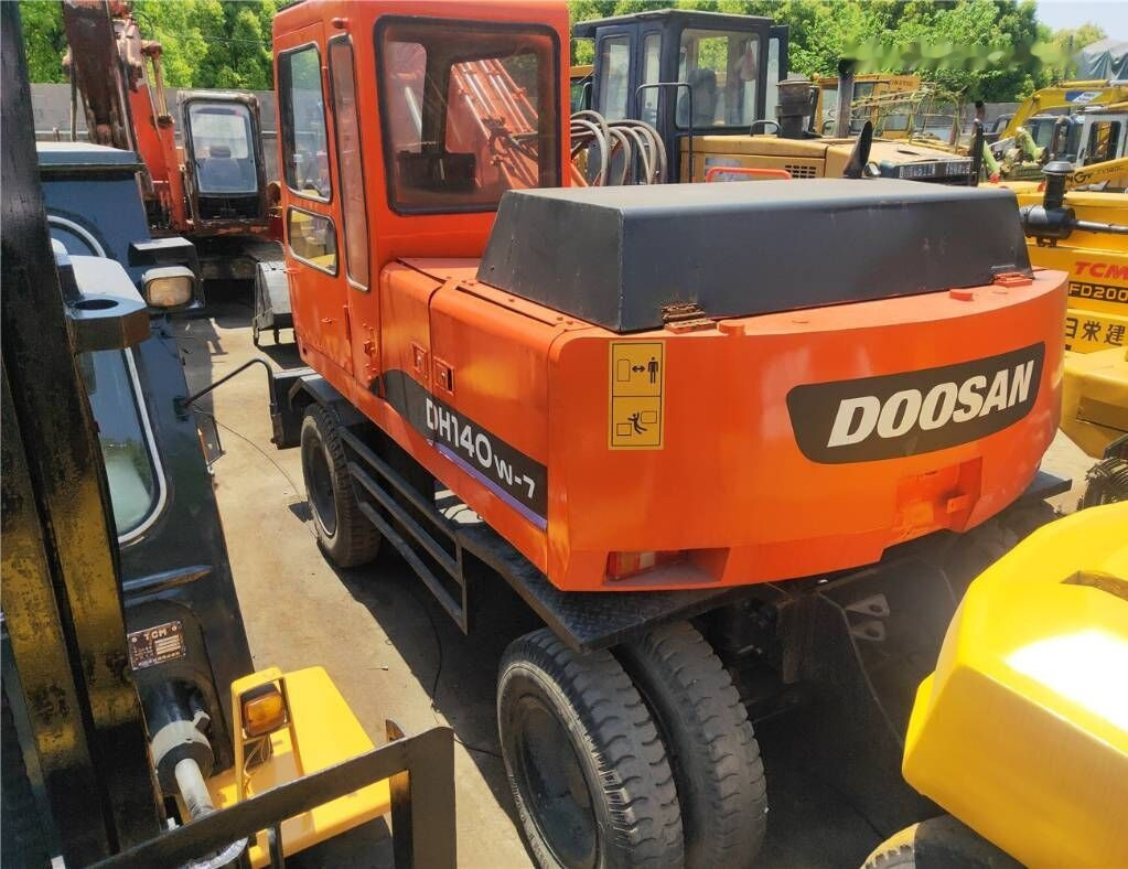 Doosan DH 140W-7 - Escavadeira de rodas: foto 3 Doosan DH 140W-7 - Escavadeira de rodas: foto 3