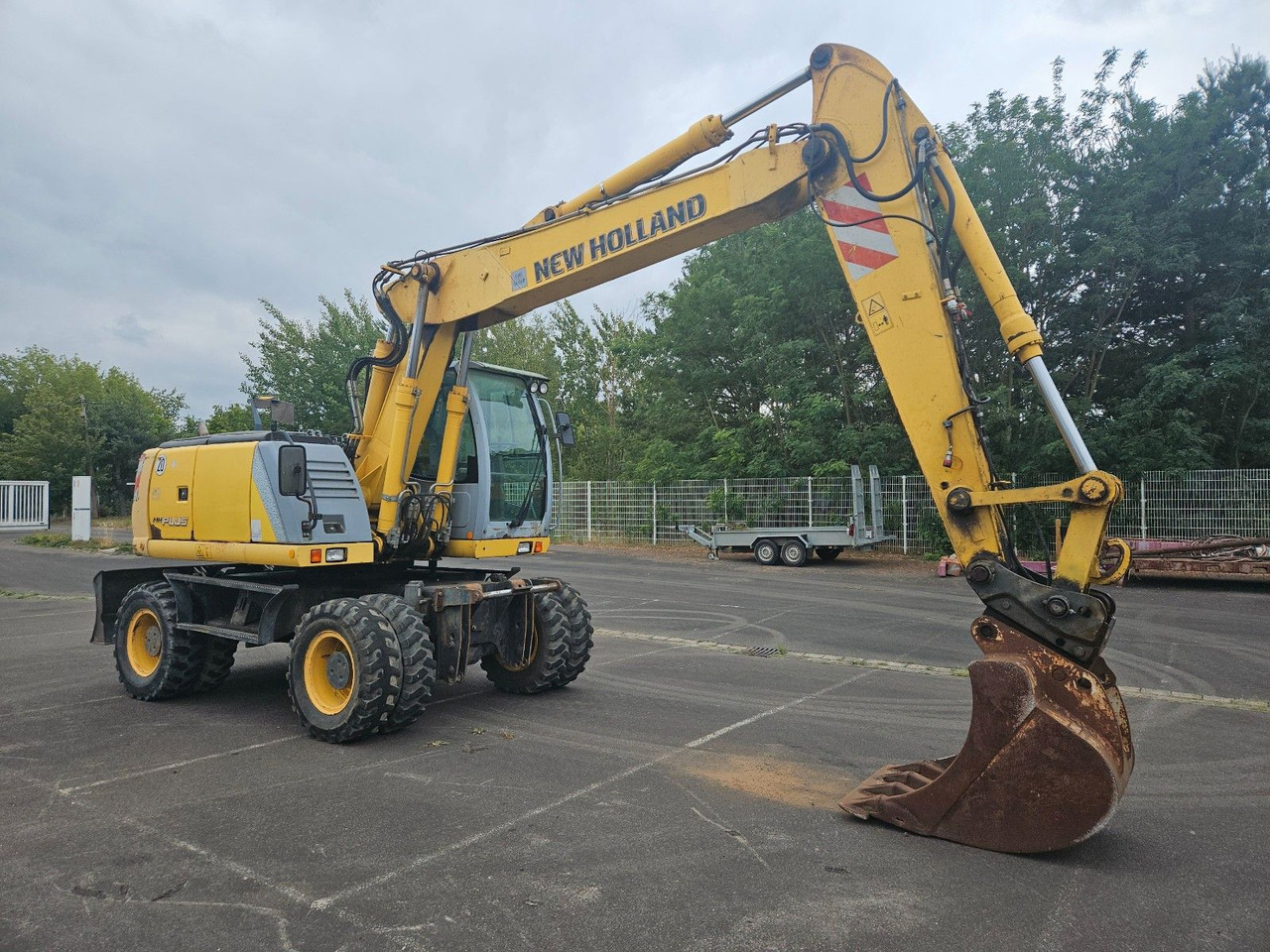 New Holland MH Plus 18t Mobilbagger - Escavadeira de rodas: foto 2 New Holland MH Plus 18t Mobilbagger - Escavadeira de rodas: foto 2