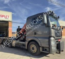 MAN TGX 35.480 - Caminhão polibenne: foto 2 MAN TGX 35.480 - Caminhão polibenne: foto 2