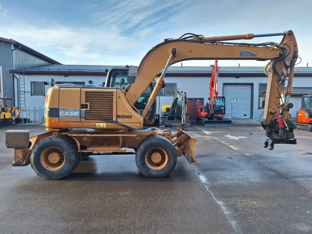 Case WX145 PYÖRITTÄJÄLLÄ - Escavadeira de rodas: foto 5 Case WX145 PYÖRITTÄJÄLLÄ - Escavadeira de rodas: foto 5