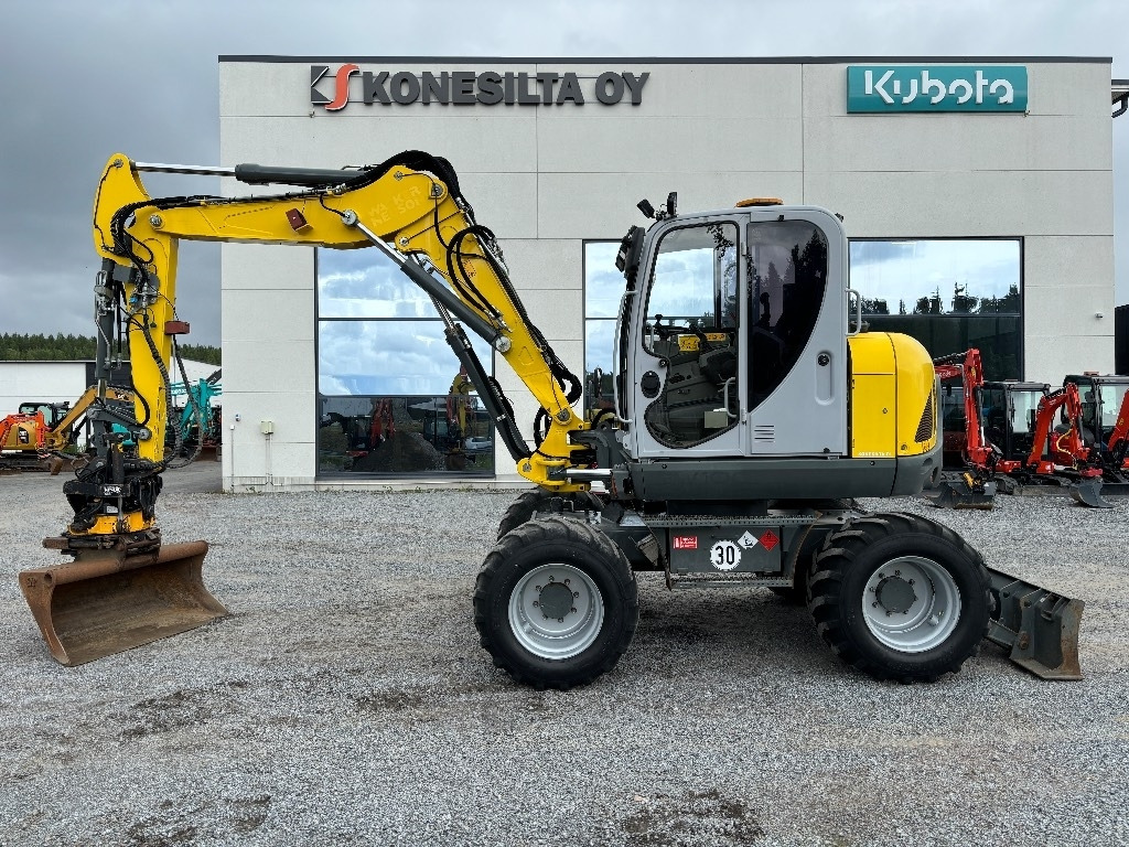 Wacker Neuson EW 100  - Escavadeira de rodas: foto 1 Wacker Neuson EW 100  - Escavadeira de rodas: foto 1