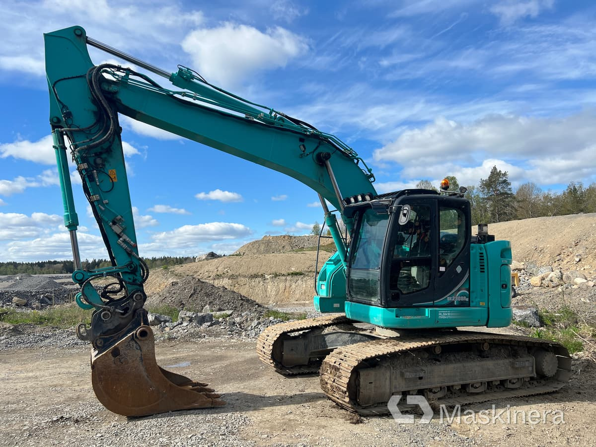 Grävmaskin Kobelco SK230SRLC-5E med tiltrotator & skopor - Escavadora de rastos: foto 1 Grävmaskin Kobelco SK230SRLC-5E med tiltrotator & skopor - Escavadora de rastos: foto 1