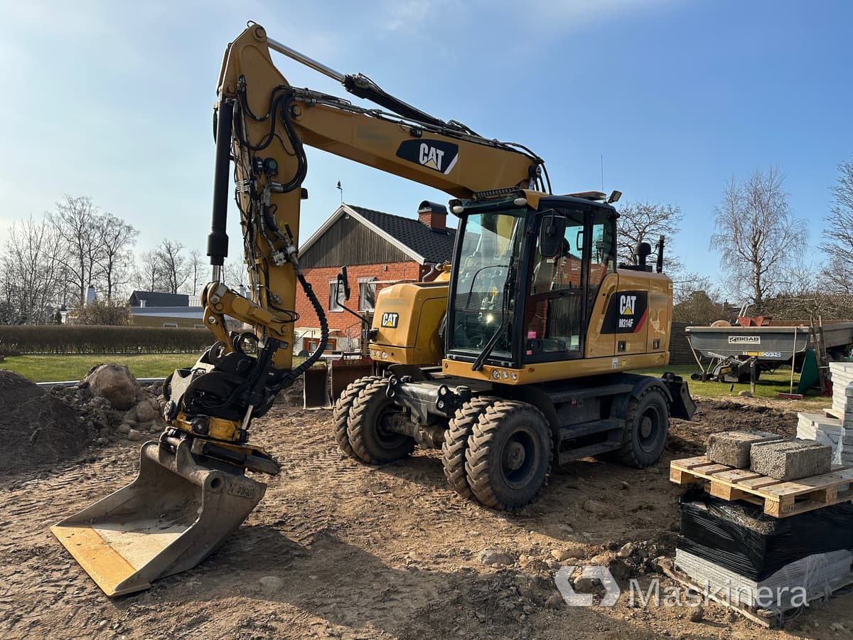 Hjulgrävare Cat M314F + redskap/vagn/grävsystem - Escavadora de rastos: foto 1 Hjulgrävare Cat M314F + redskap/vagn/grävsystem - Escavadora de rastos: foto 1