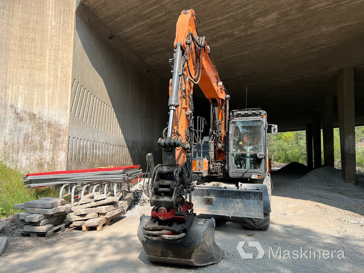 Hjulgrävare Doosan DX160W med tillbehör - Escavadora de rastos: foto 2 Hjulgrävare Doosan DX160W med tillbehör - Escavadora de rastos: foto 2