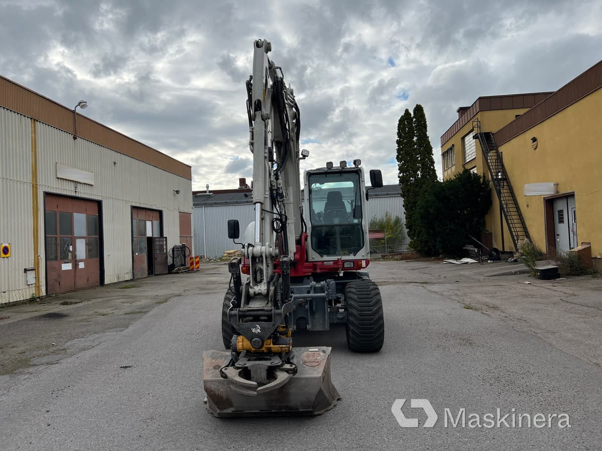 Hjulgrävare Takeuchi TB295W med vagn & redskap - Escavadora de rastos: foto 2 Hjulgrävare Takeuchi TB295W med vagn & redskap - Escavadora de rastos: foto 2