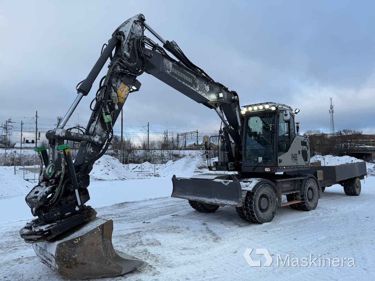 Hjulgrävare Volvo EW160E med tillbehör - Escavadora de rastos: foto 1 Hjulgrävare Volvo EW160E med tillbehör - Escavadora de rastos: foto 1