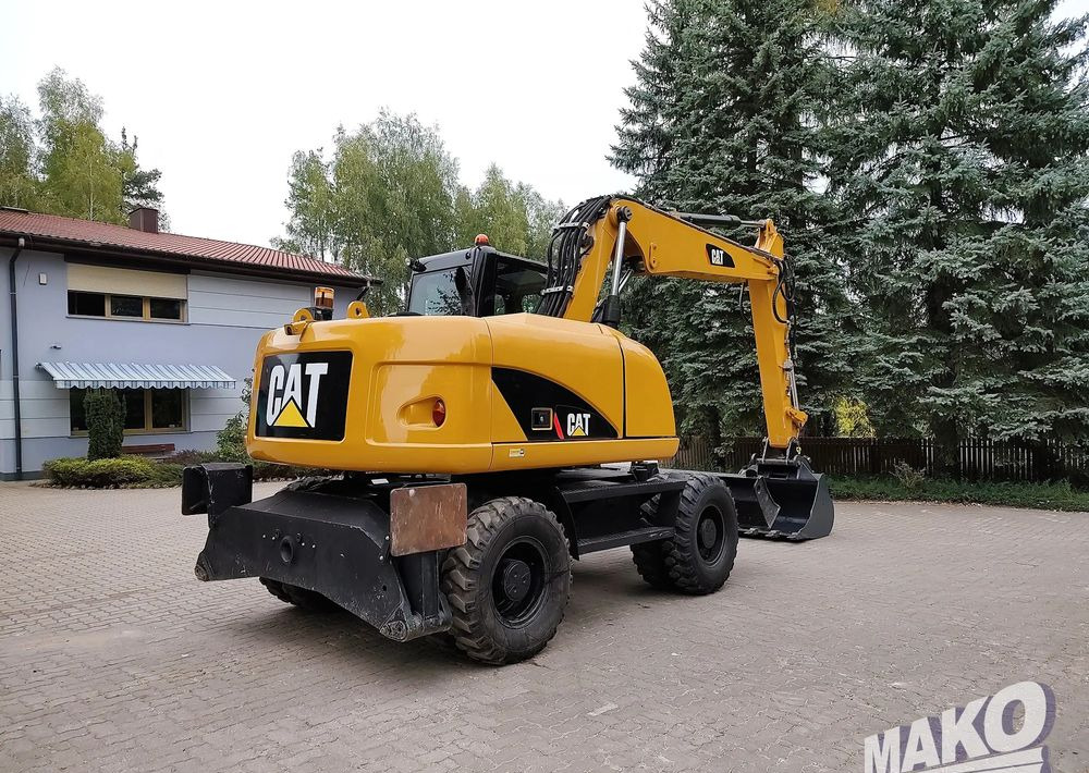 Caterpillar M313D - Escavadeira de rodas: foto 4 Caterpillar M313D - Escavadeira de rodas: foto 4