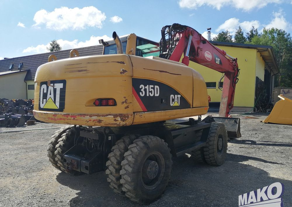 Caterpillar M315 C - Escavadeira de rodas: foto 5 Caterpillar M315 C - Escavadeira de rodas: foto 5