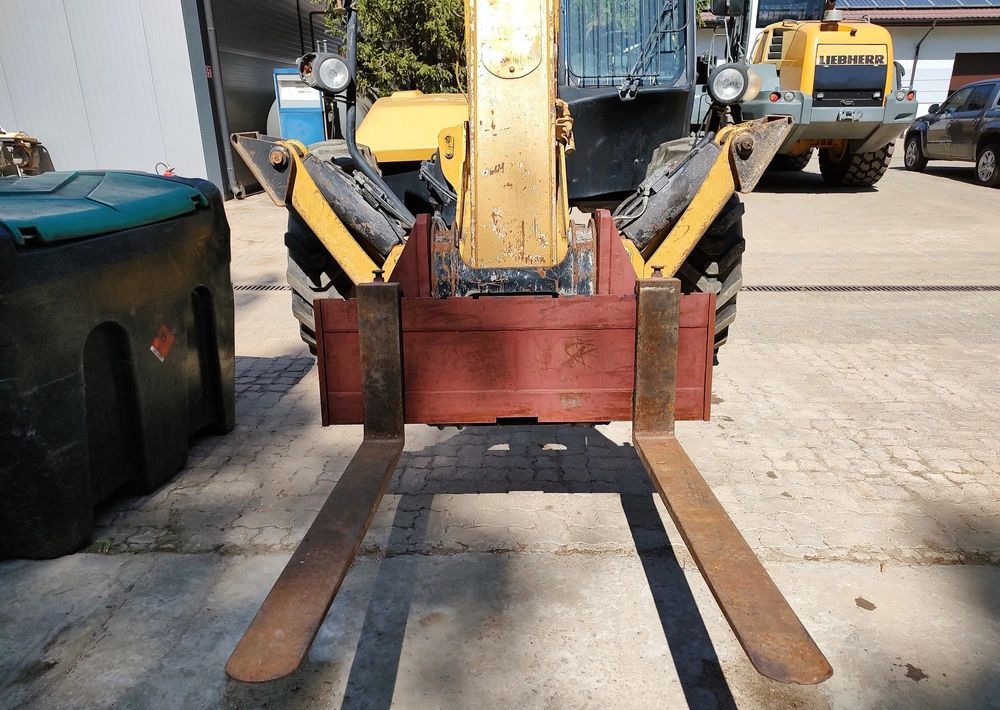 Caterpillar TH417 - Empilhador telescópico: foto 3 Caterpillar TH417 - Empilhador telescópico: foto 3