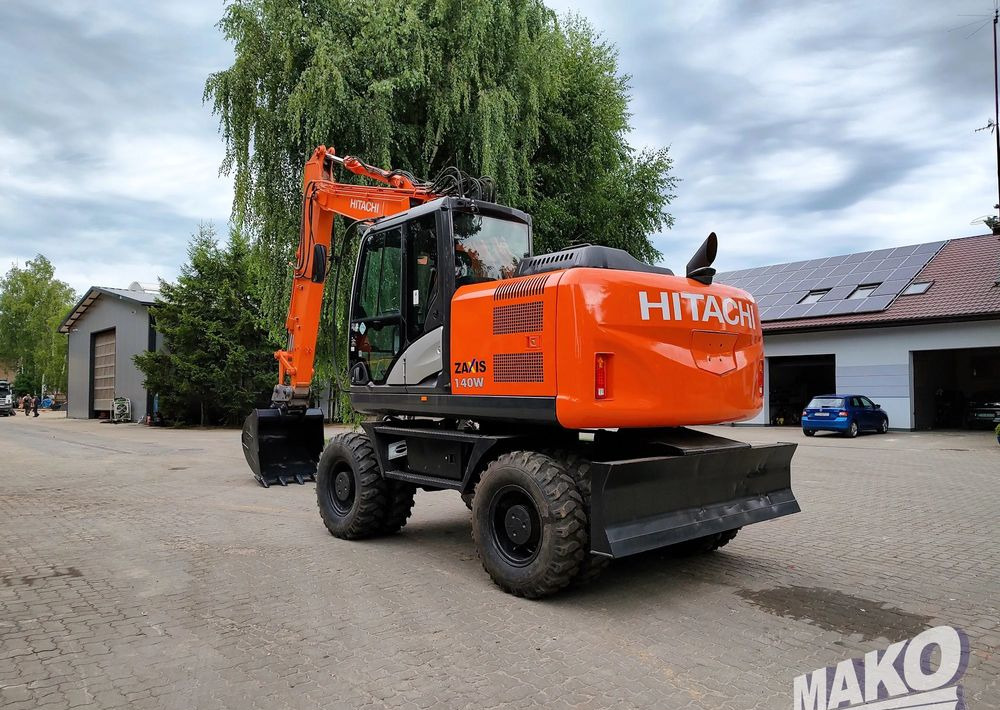 Hitachi ZX 140 - Escavadeira de rodas: foto 2 Hitachi ZX 140 - Escavadeira de rodas: foto 2
