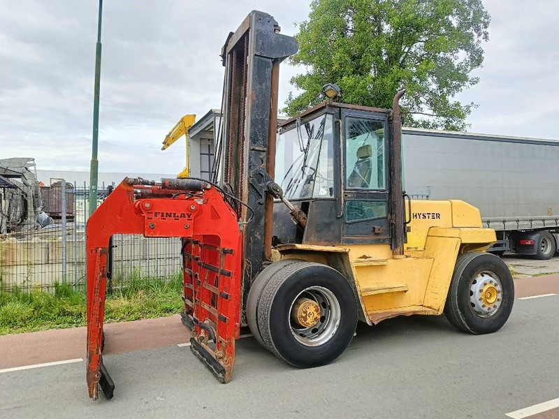 Hyster H 12.00 XL 12 ton heftruck met stenenklem forklift - Empilhadeira a diesel: foto 1 Hyster H 12.00 XL 12 ton heftruck met stenenklem forklift - Empilhadeira a diesel: foto 1