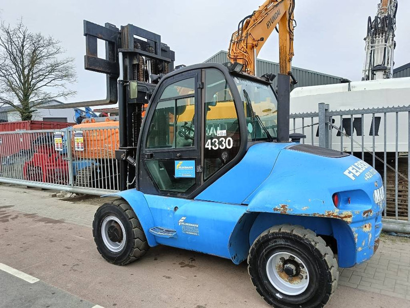 Manitou MI 70 H freelift ruw terrein 7 T heftruck forklift - Empilhadeira a diesel: foto 4 Manitou MI 70 H freelift ruw terrein 7 T heftruck forklift - Empilhadeira a diesel: foto 4
